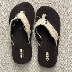 Brown flip flops
